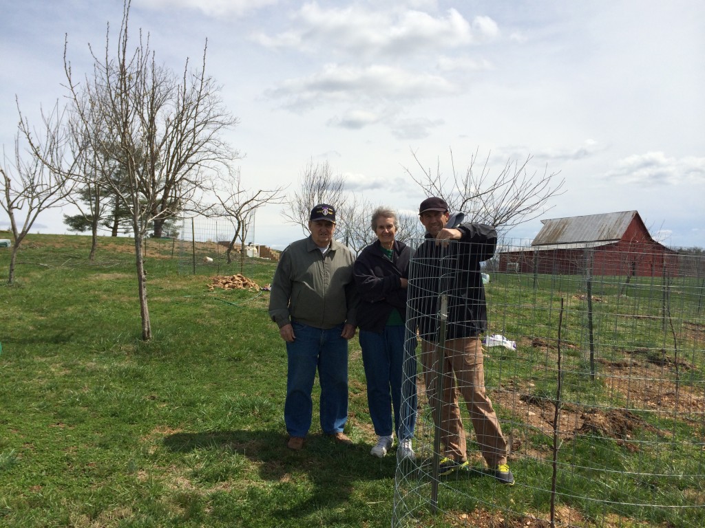 Uncle Sonny, my Mom, and brother Mark help put up the final cages